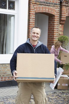 Removal team planning a residential move in a Swiss city apartment