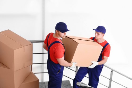 People preparing boxes for a removals service in Switzerland
