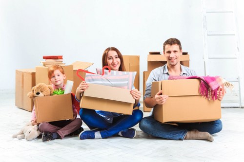 Packed moving boxes and furniture ready for transport in Switzerland