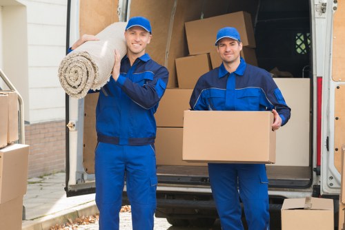 Removal team planning a move in a Swiss city apartment area