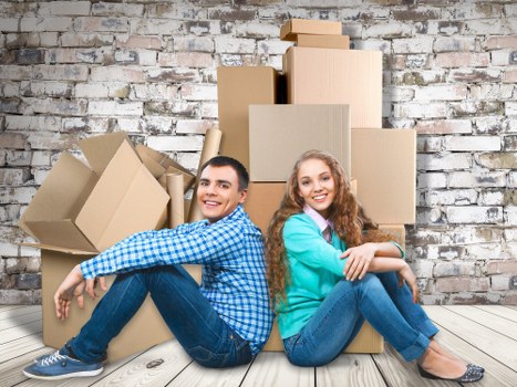 Packed boxes and protected furniture ready for transport during a home move in Switzerland