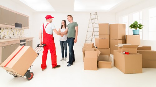 Team safely handling furniture during a move
