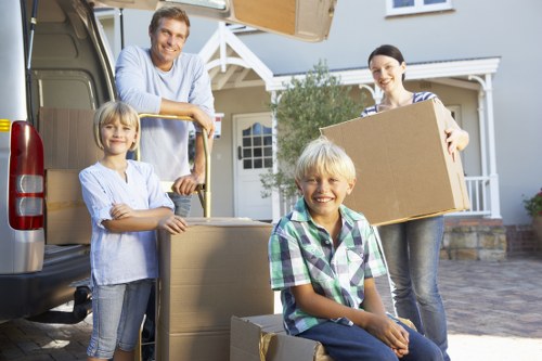 Loading furniture into a moving van for a home move in Switzerland