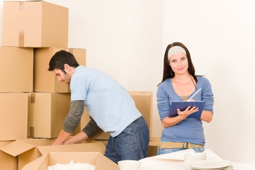 Moving boxes and furniture in a carefully organized relocation
