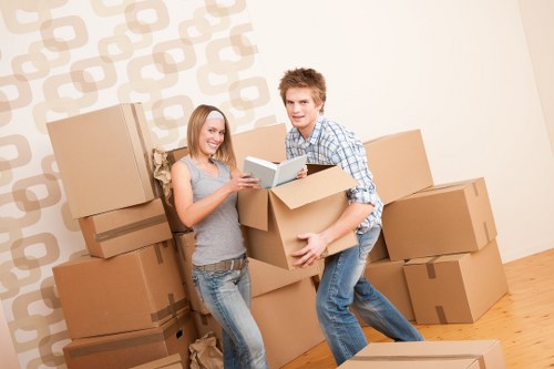 Commercial removal team moving office equipment in Switzerland